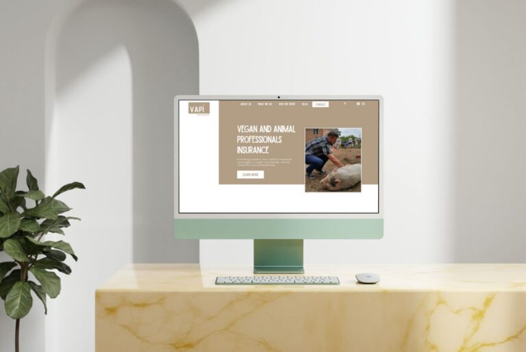iMac showing vegan website design VAPI vegan insurance business